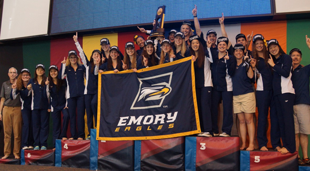 The Emory women’s swimming and diving team stands proud on the podium after winning the 2015 NCAA Division III Championships in Shenandoah, Texas. This year marks the team’s sixth-straight win. The men’s team placed fourth in the competition. | Courtesy of Emory Athletics