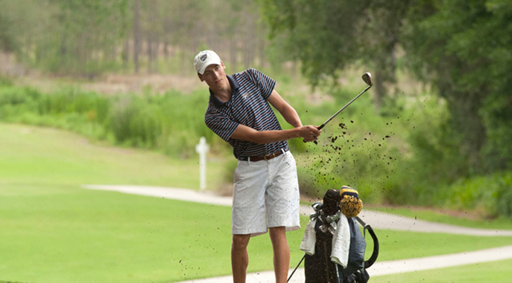 Senior Alex Wunderlich swings his club. Wunderlich and the golf team will host the Emory Spring Invitational at the Barnsley Resort in Adairsville (Ga.). | Courtesy of Emory Athletics