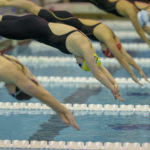 Swim and dive teams secure 25th consecutive UAA titles